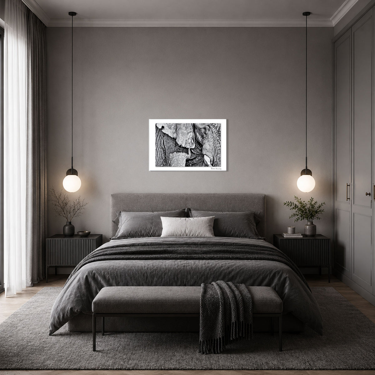 A modern gray bedroom and a framed black-and-white abstract photographic print by Peter Delaney centered above the bed.