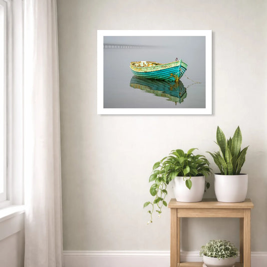 Bird On A Boat by Chris Daly, South African fine art photography print of a turquoise boat on Knysna Lagoon, displayed in a light contemporary interior.