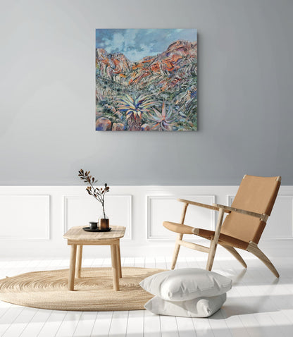 Meiringspoort by Hein Botha, an expressive South African landscape painting of the dramatic rocky mountains and vegetation of Meiringspoort, shown in a contemporary interior.