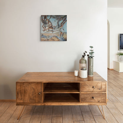 Shepherd Tree Tango by Hein Botha, acrylic landscape painting displayed above a wooden cabinet in a contemporary neutral interior.