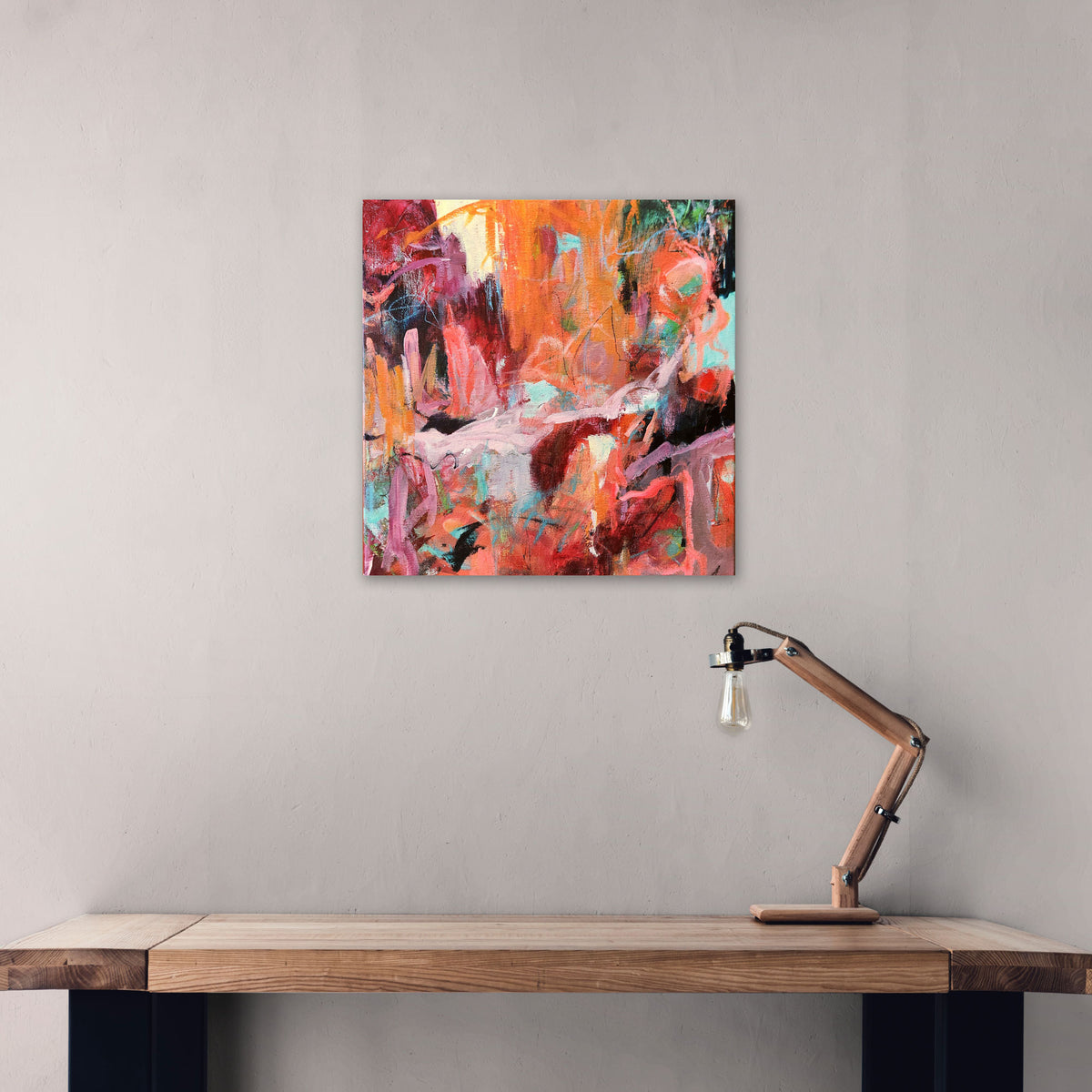 Karen Hammat’s Memories of Childhood abstract painting displayed above a wooden desk in a contemporary interior.